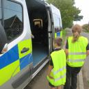 Junior Road Safety Officers looking in Police van
